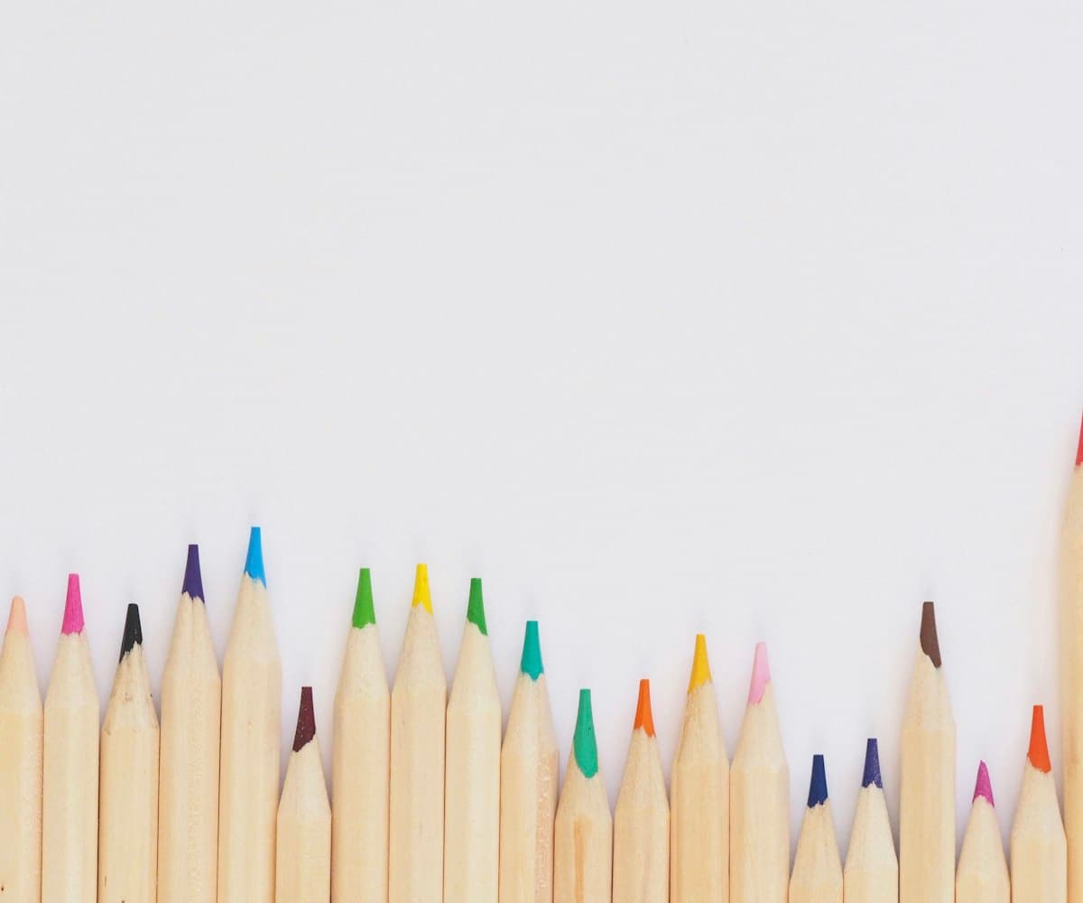 Coloured pencils lined up in order